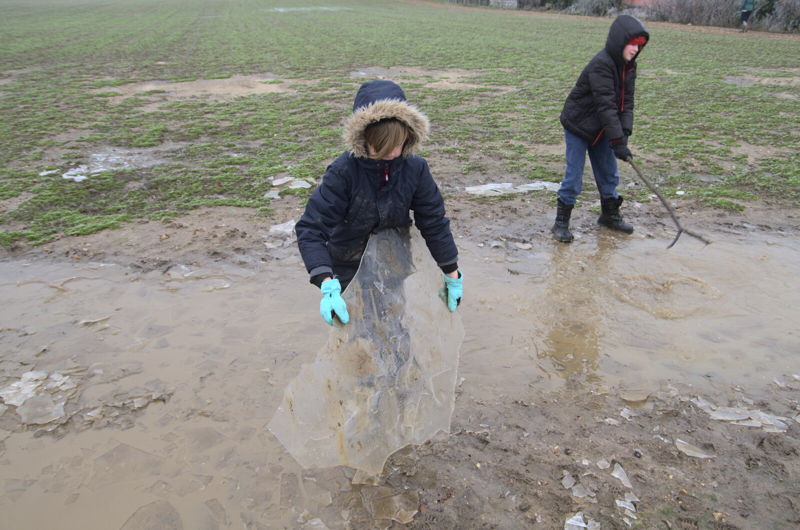 Harry picks up a big sheet of ice from Fun With Ice in Lockdown, Brome, Suffolk - 10th January 2021