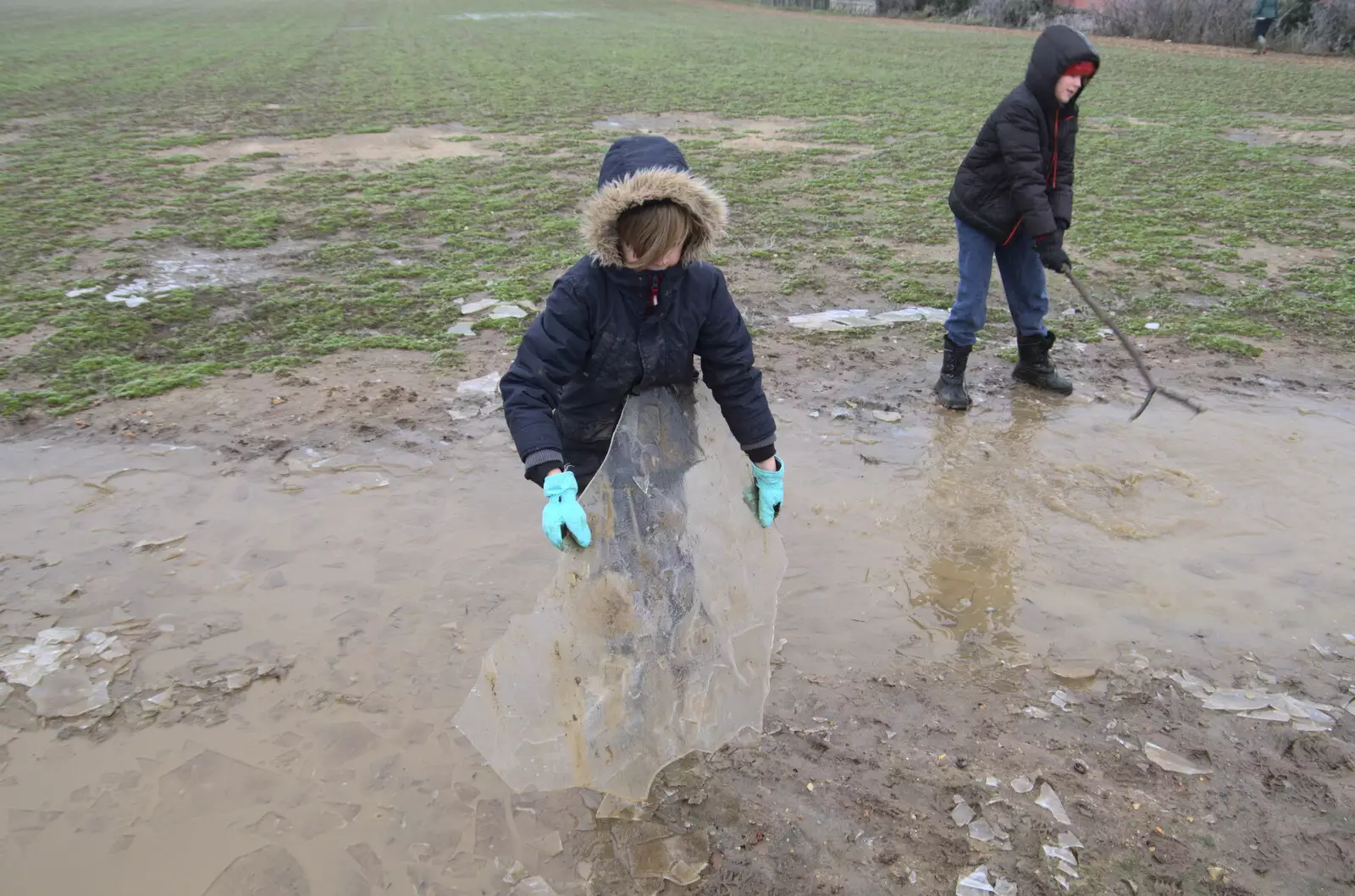 Harry picks up a big sheet of ice, from Fun With Ice in Lockdown, Brome, Suffolk - 10th January 2021