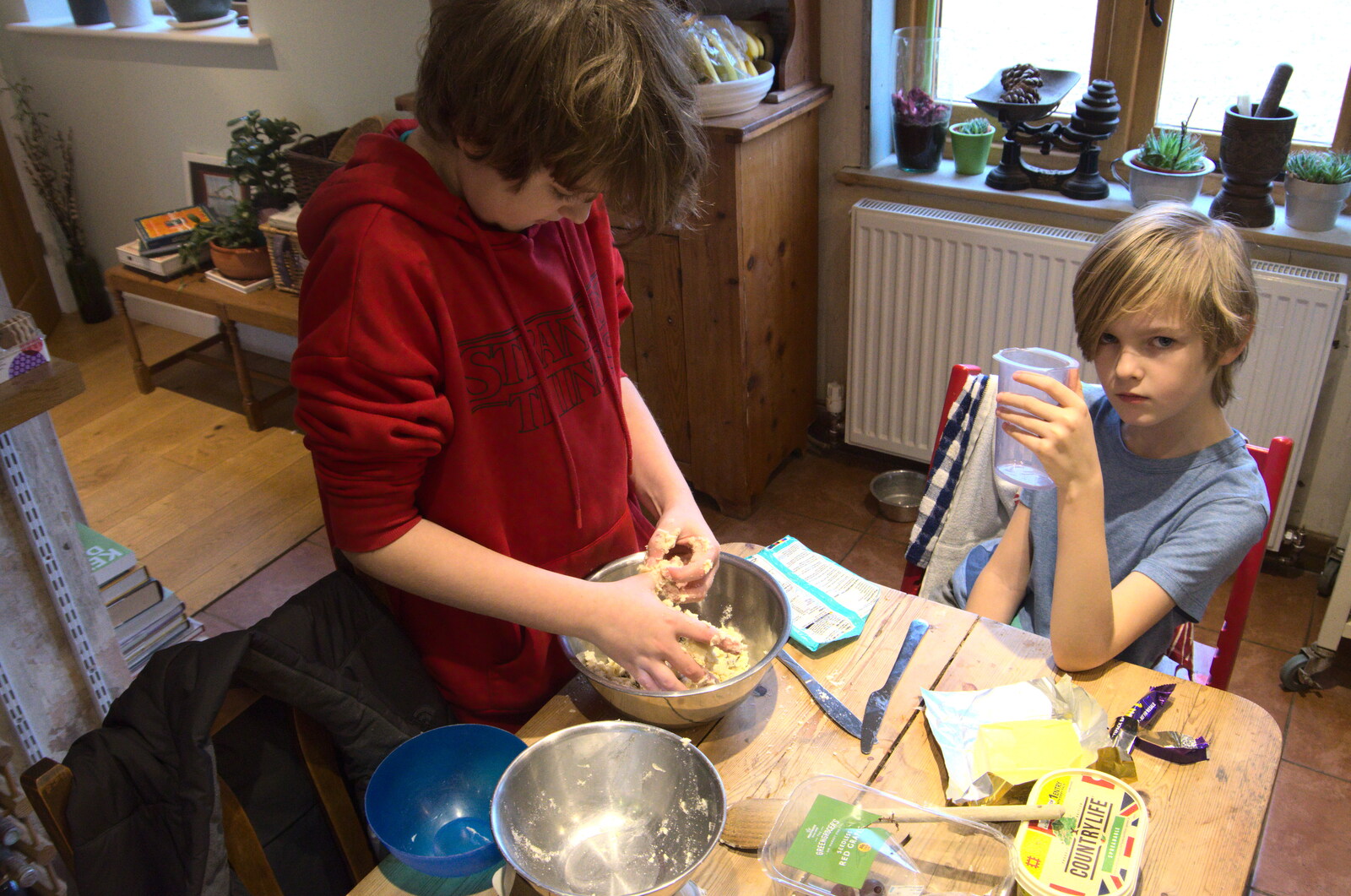 Harry looks up as Fred makes cookies from A Snowy Morning, Diss, Norfolk - 16th January 2021