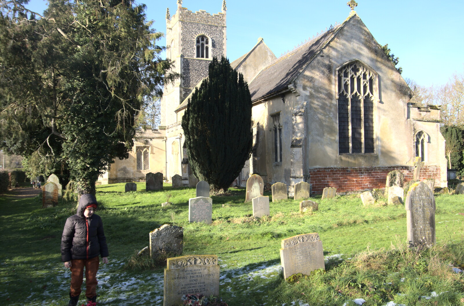 Fred looks at gravestones in the graveyard from Winter Lockdown Walks, Thrandeston and Brome, Suffolk - 24th January 2021
