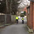 Isobel and Harry ride off down Dove Lane, A Trip to the Blue Shop, Church Street, Eye, Suffolk - 2nd February 2021