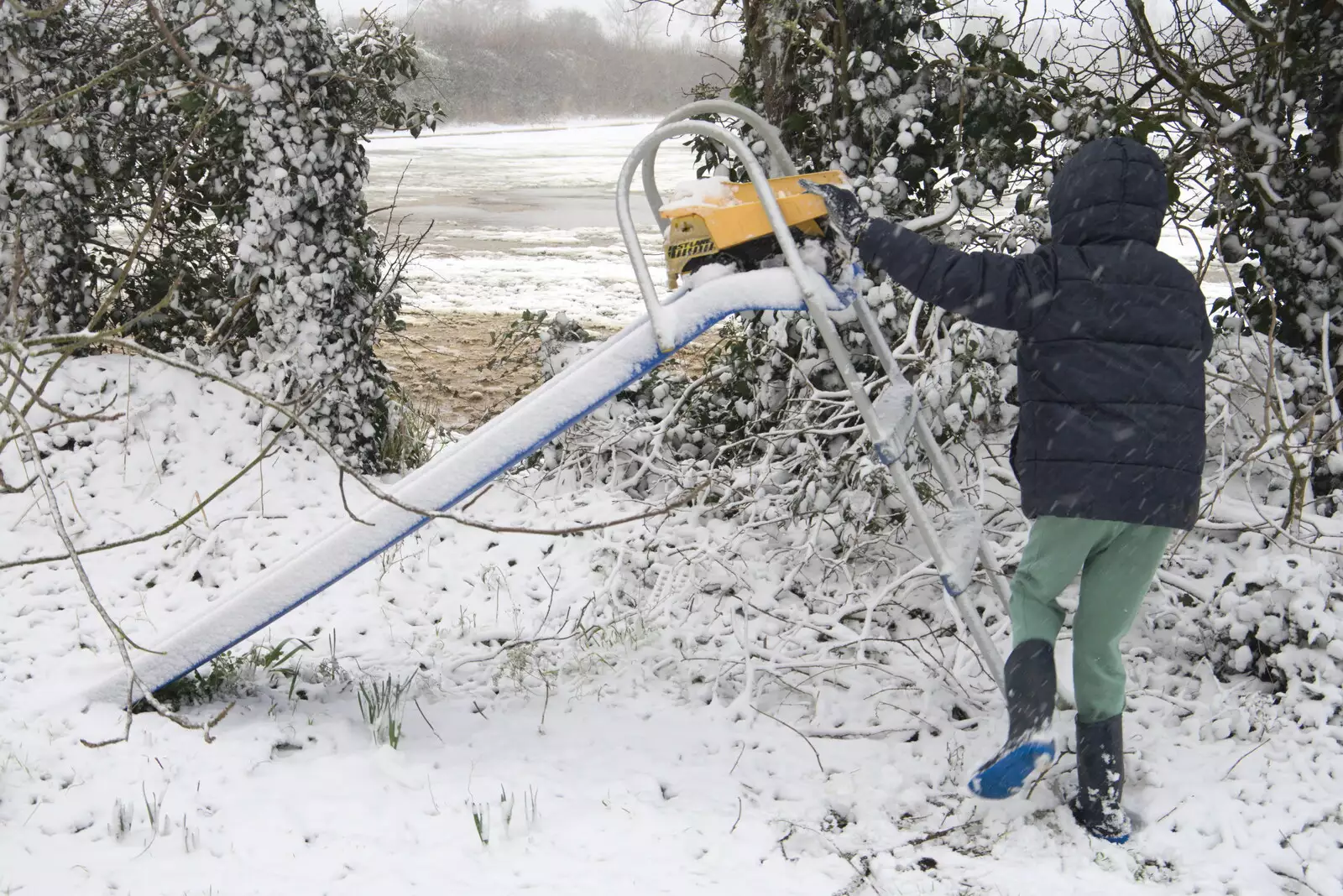 Harry pushes the toy lorry down the slide, from Beast From The East Two - The Sequel, Brome, Suffolk - 8th February 2021