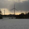 Snow looms behind the wind turbines, Derelict Infants School and Ice Sculptures, Diss and Palgrave, Norfolk and Suffolk - 13th February 2021