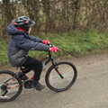 Harry cycles up the road, The Old Sewage Works, The Avenue, Brome, Suffolk - 20th February 2021