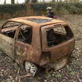 The boys inspect a burned-out car, The Old Sewage Works, The Avenue, Brome, Suffolk - 20th February 2021