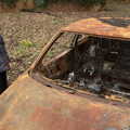 Harry looks at the wrecked car, The Old Sewage Works, The Avenue, Brome, Suffolk - 20th February 2021
