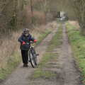 Harry pushes his bike up the hill, The Old Sewage Works, The Avenue, Brome, Suffolk - 20th February 2021