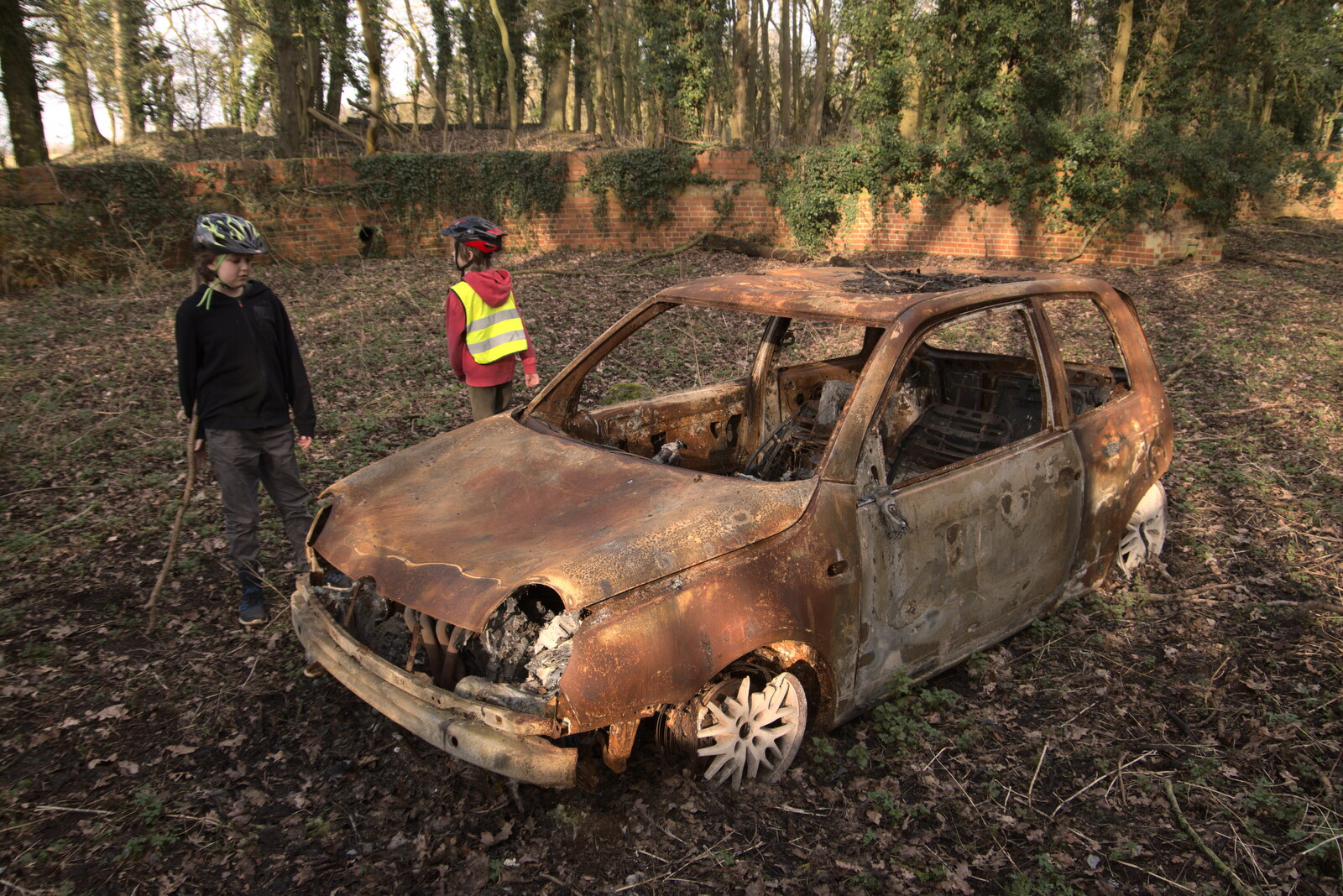 The boys inspect the derelict car from Fred's New Bike and an A140 Closure, Brome, Suffolk - 27th February 2021
