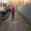 Fred bikes down to the bridge, The Mean Streets of Eye, Suffolk - 7th March 2021