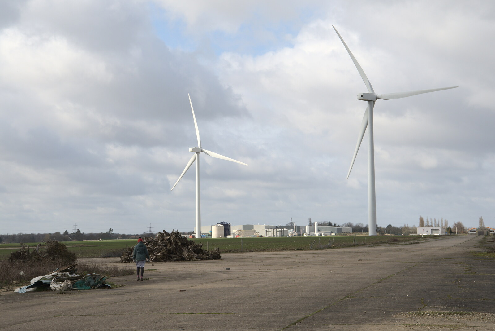 Isobel contemplates the wind turbines from Another Walk on Eye Airfield, Eye, Suffolk - 14th March 2021
