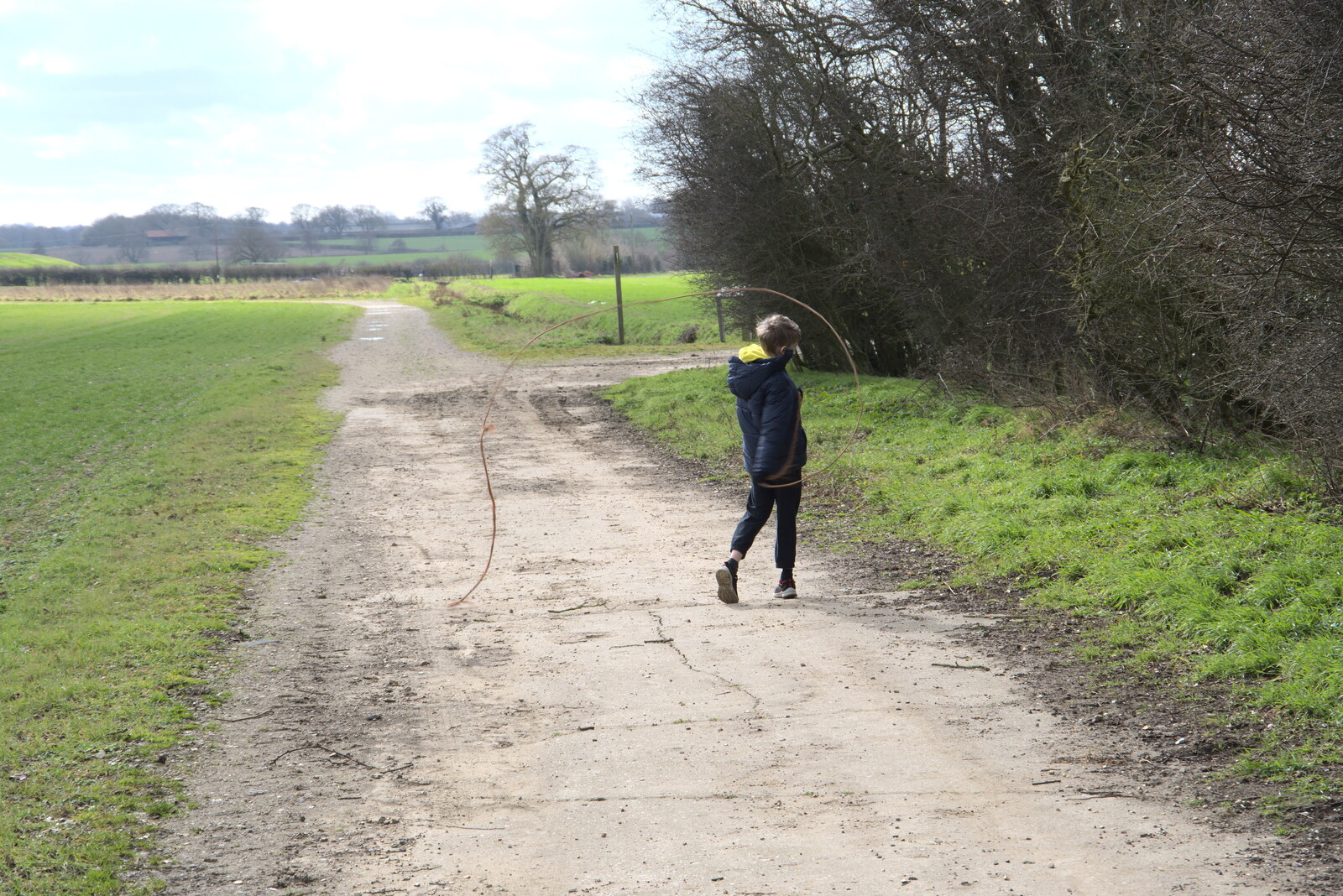 Harry finds some old rope to wave around from Another Walk on Eye Airfield, Eye, Suffolk - 14th March 2021