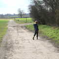 Harry finds some old rope to wave around, Another Walk on Eye Airfield, Eye, Suffolk - 14th March 2021