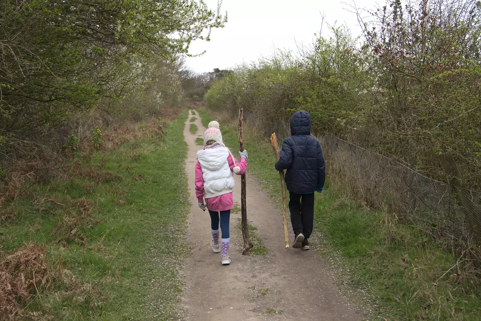 Megan and Harry each have s big stick, from A Trip to Dunwich Beach, Dunwich, Suffolk - 2nd April 2021