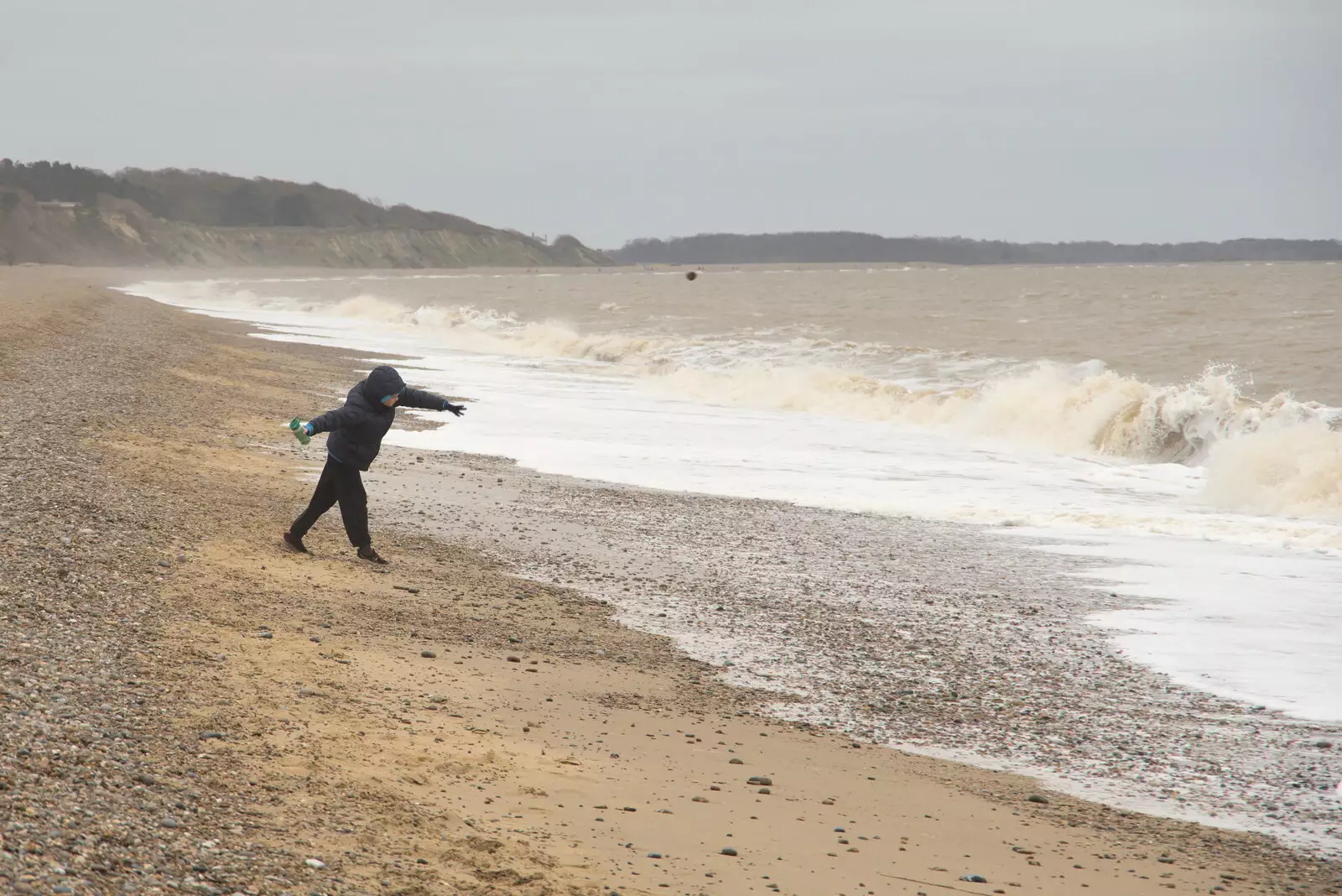 Harry throws a rock into the sea, from A Trip to Dunwich Beach, Dunwich, Suffolk - 2nd April 2021