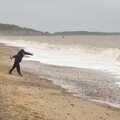 Harry throws a rock into the sea, A Trip to Dunwich Beach, Dunwich, Suffolk - 2nd April 2021