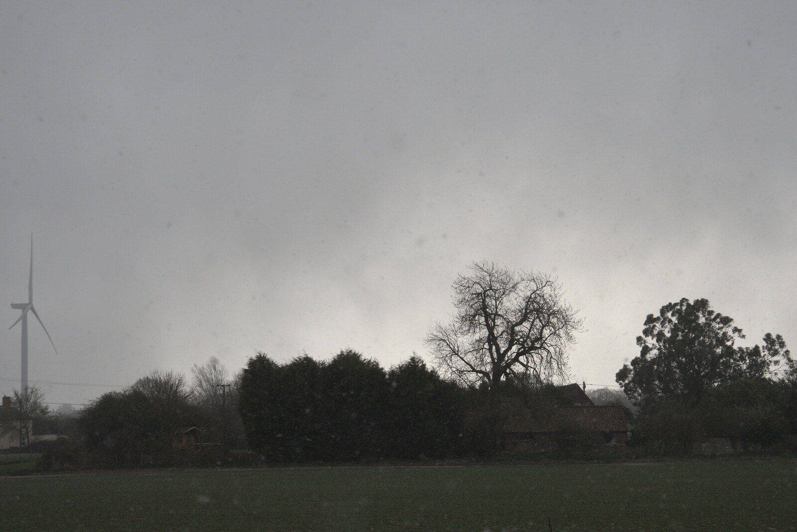 Snow drifts over the side field from Roadworks and Harry's Trampoline, Brome, Suffolk - 6th April 2021