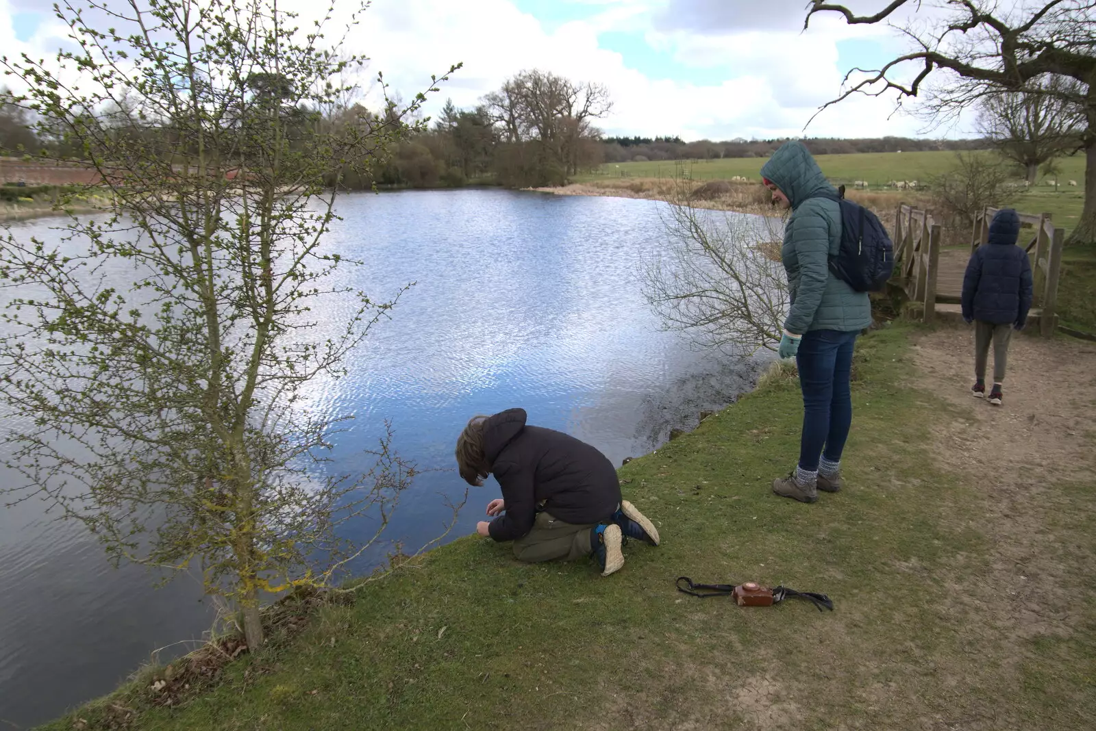 Fred puts his leaf boat out to sea, from A Return to Ickworth House, Horringer, Suffolk - 11th April 2021