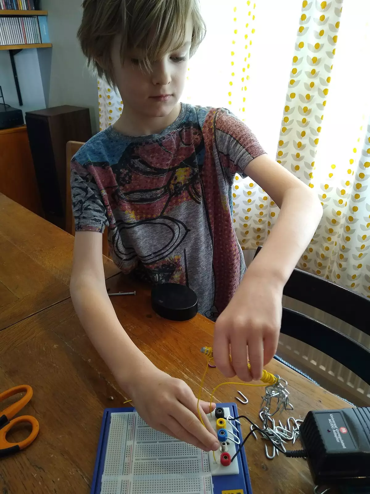 Harry tests his electromagnet out, from A Cameraphone Roundup, Brome and Eye, Suffolk - 12th April 2021