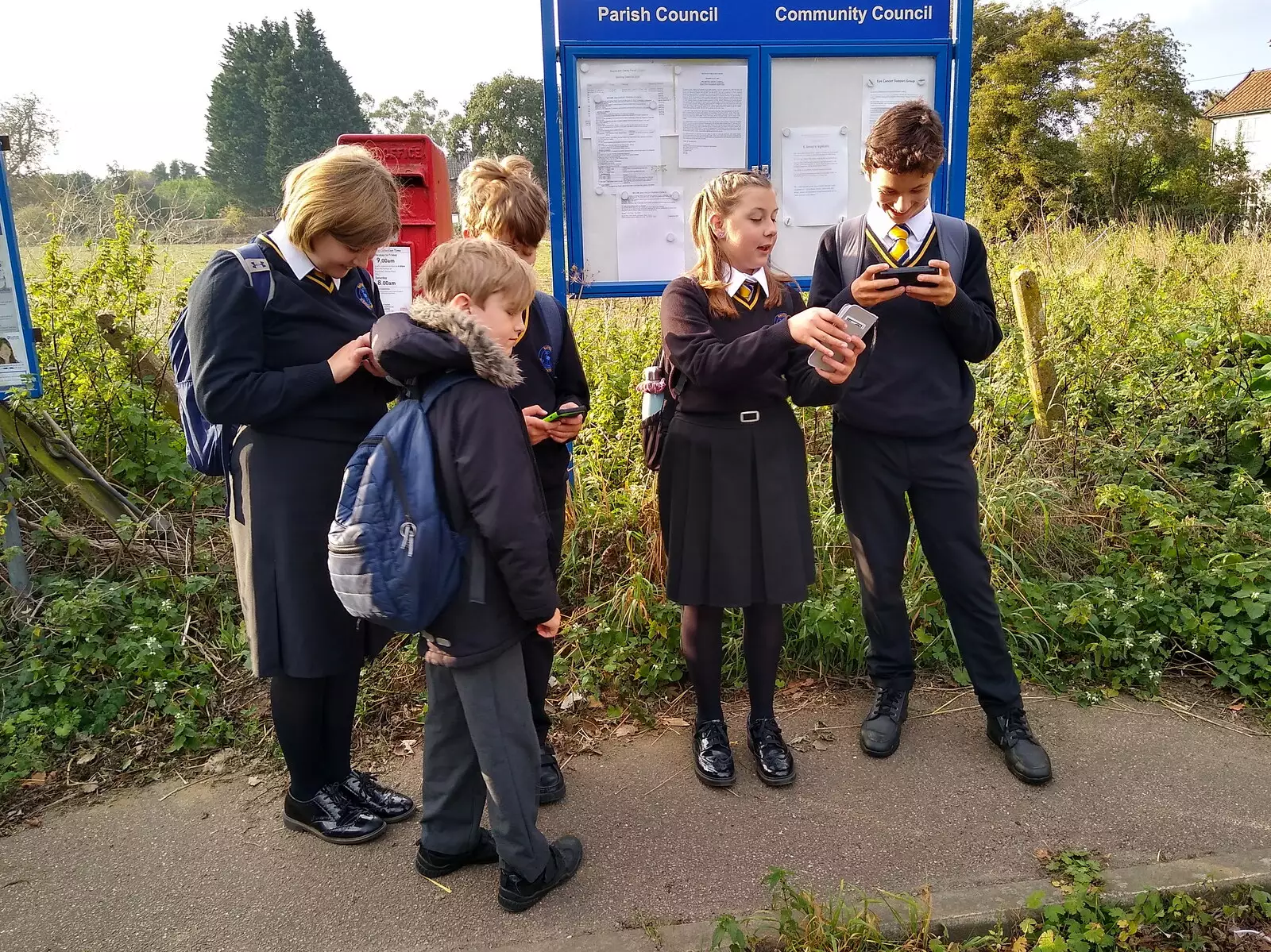 It's all about devices at the bus stop, from A Cameraphone Roundup, Brome and Eye, Suffolk - 12th April 2021