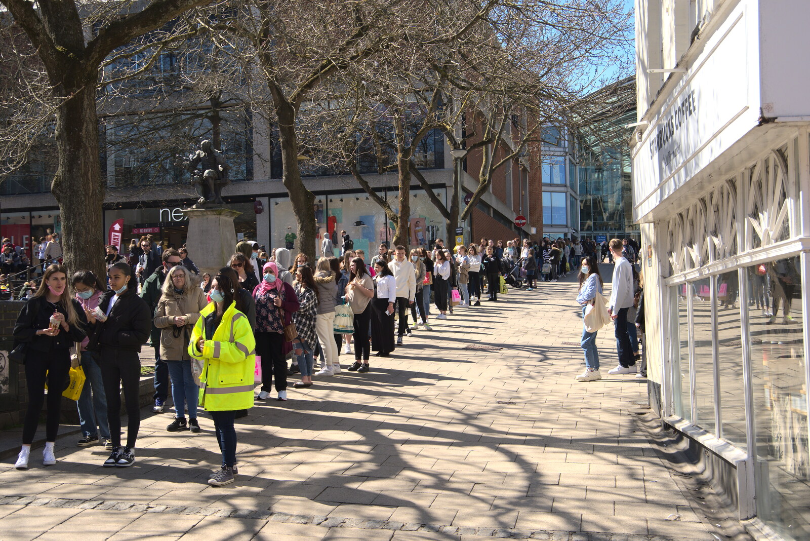The queue for Primark stretches to the Forum from The Death of Debenhams, Rampant Horse Street, Norwich, Norfolk - 17th April 2021
