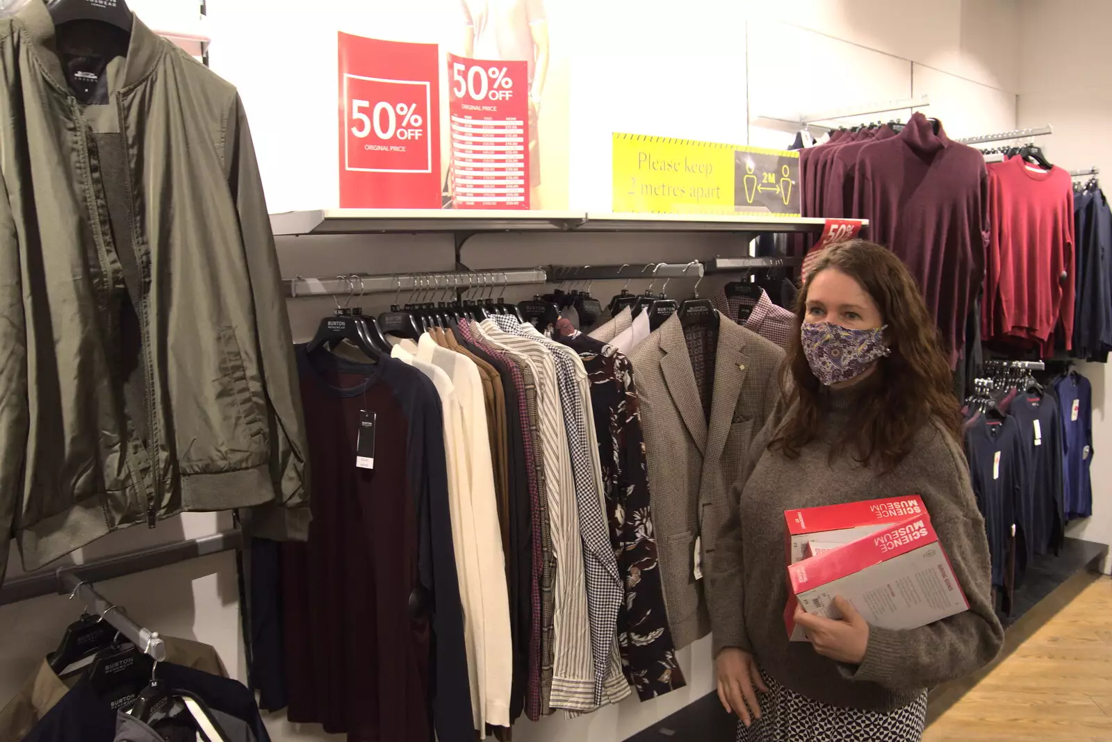 Isobel wanders about looking for stuff, from The Death of Debenhams, Rampant Horse Street, Norwich, Norfolk - 17th April 2021