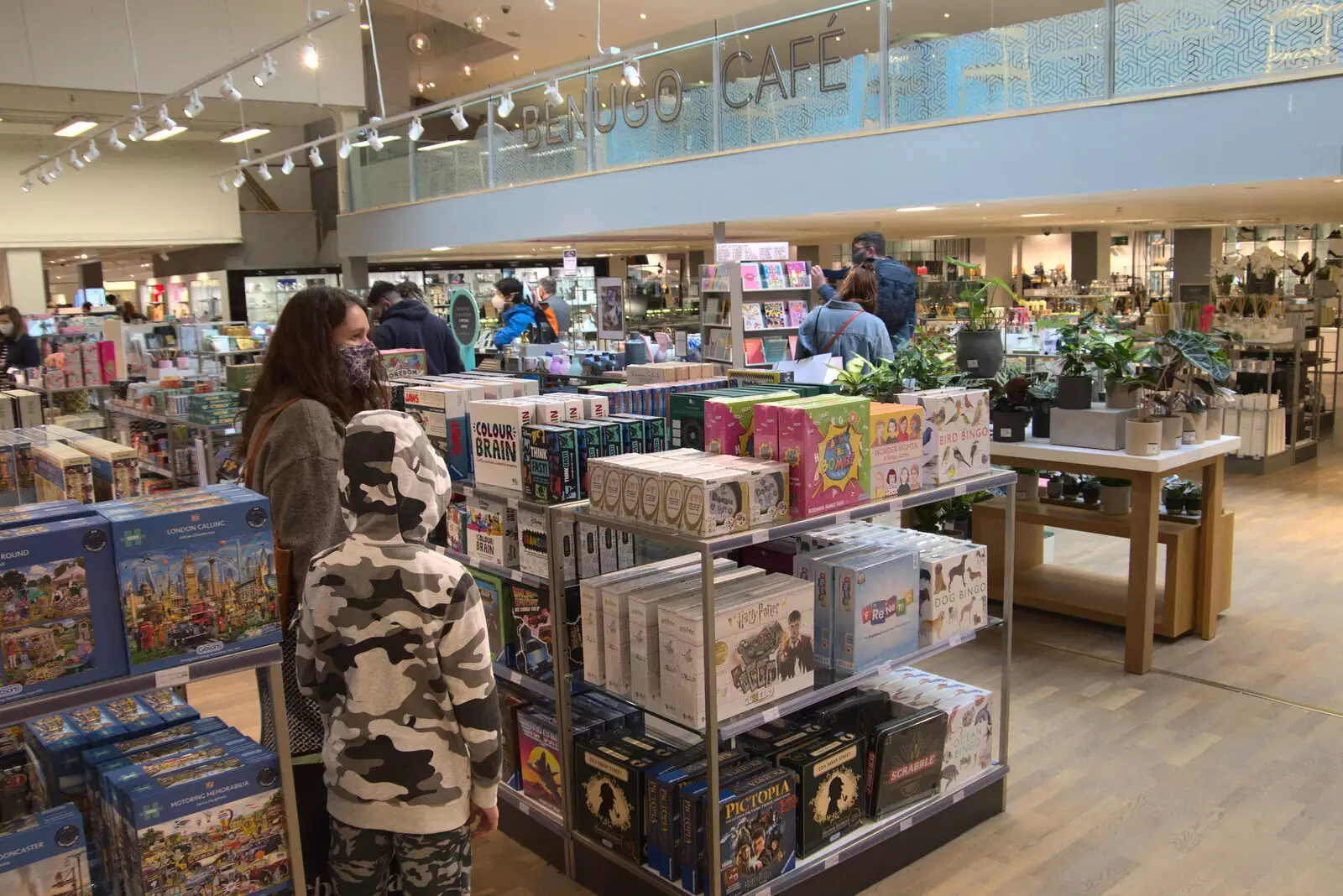 Isobel and Harry look around in the games section, from The Death of Debenhams, Rampant Horse Street, Norwich, Norfolk - 17th April 2021