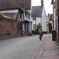 Harry and Isobel cycle up Church Street, BSCC Beer Garden Hypothermia, Hoxne and Brome, Suffolk - 22nd April 2021