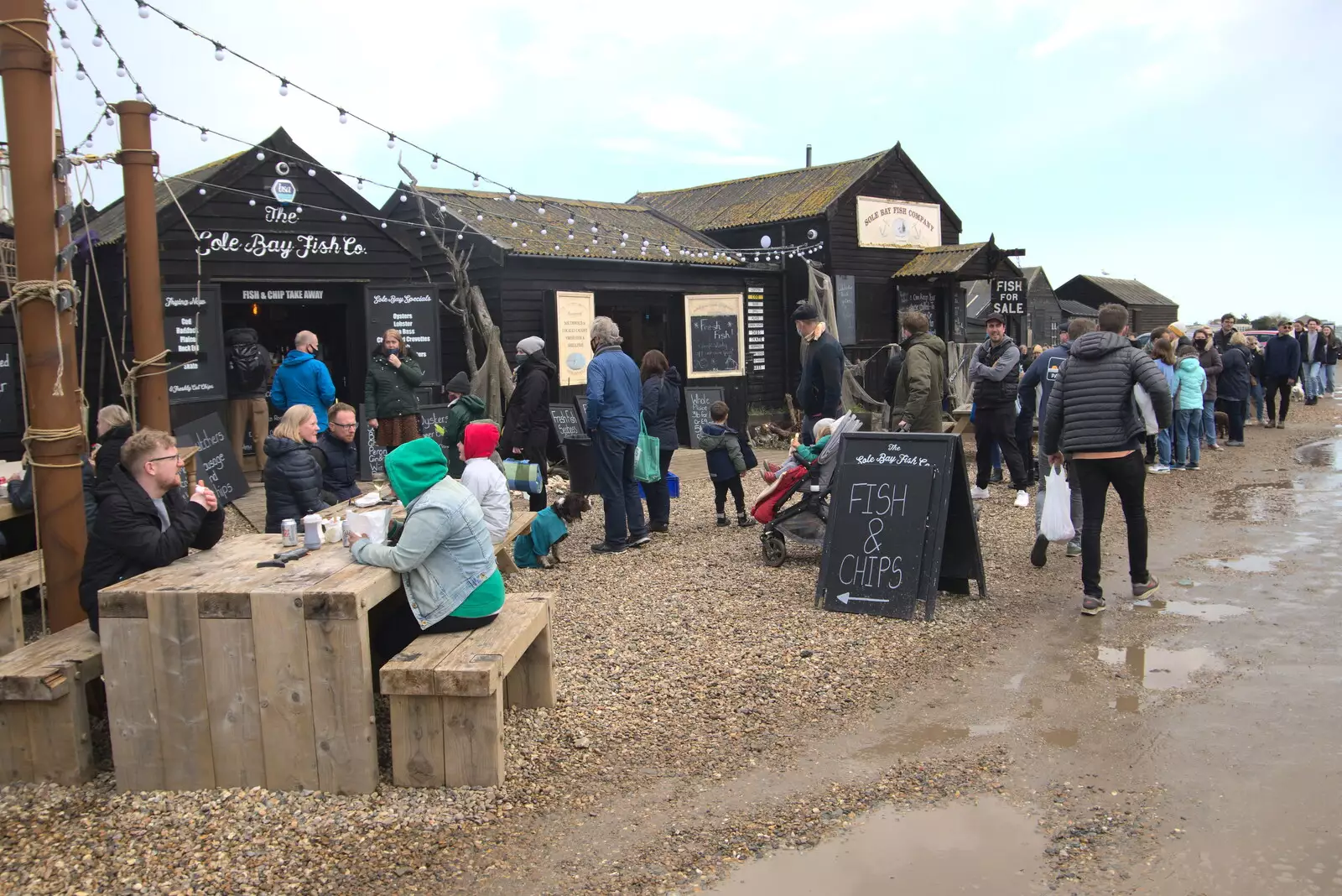 People mill around by the Sole Bay Fish Co., from A Chilly Trip to the Beach, Southwold Harbour, Suffolk - 2nd May 2021