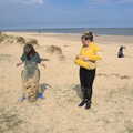 Fred dumps a pile of sand out of his teeshirt, A Chilly Trip to the Beach, Southwold Harbour, Suffolk - 2nd May 2021