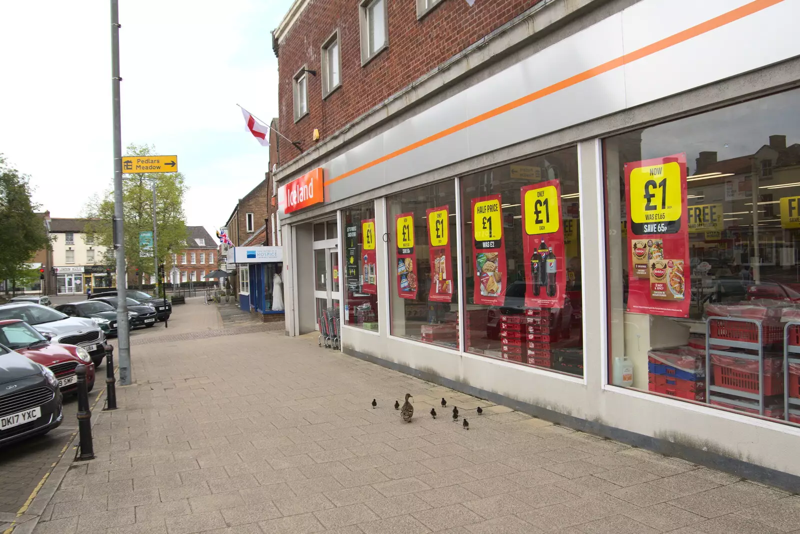 The ducks trundle past Iceland, from A Vaccination Afternoon, Swaffham, Norfolk - 9th May 2021