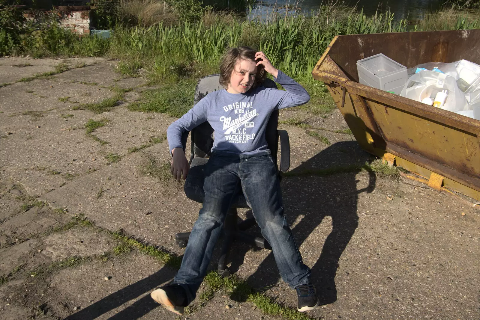 Fred finds a discarded office chair, from A Day at the Beach with Sis, Southwold, Suffolk - 31st May 2021