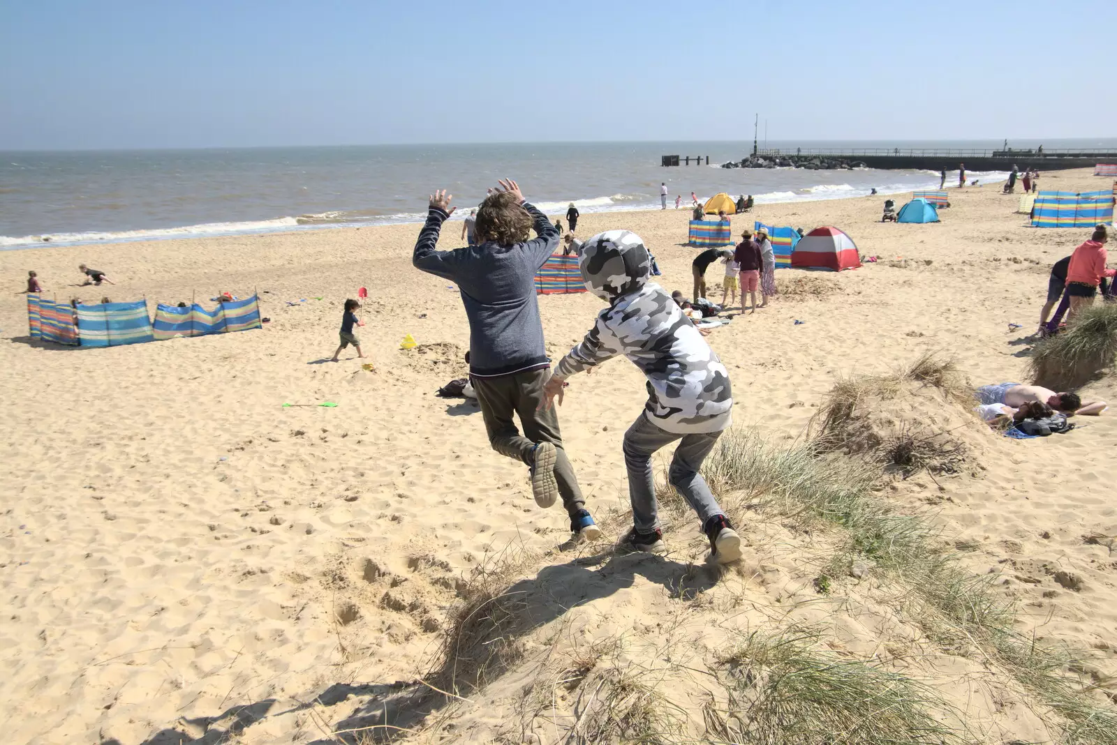 The boys jump off the dunes, from A Day at the Beach with Sis, Southwold, Suffolk - 31st May 2021