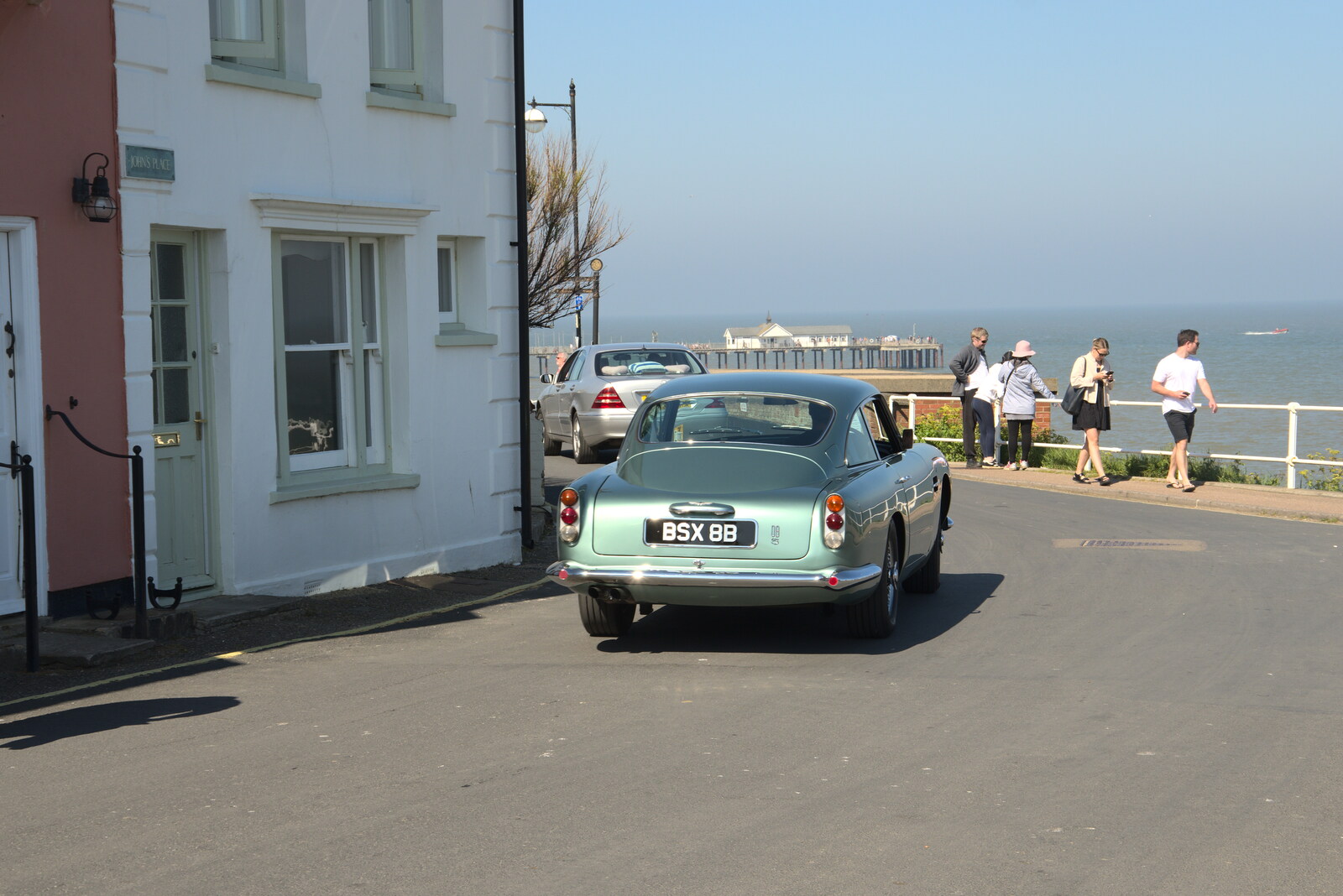 A nice green Aston-Martin drives past from A Day at the Beach with Sis, Southwold, Suffolk - 31st May 2021