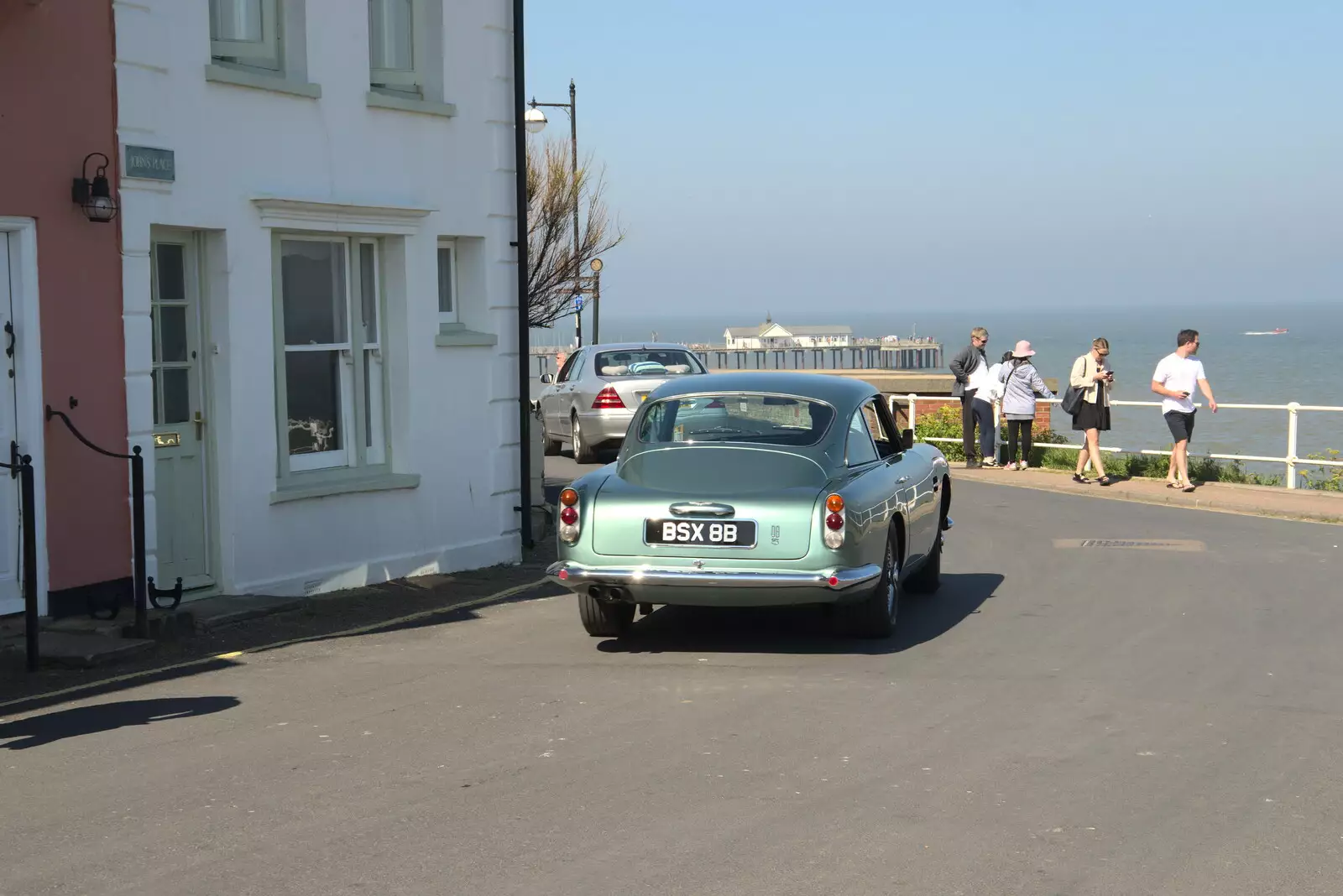 A nice green Aston-Martin drives past, from A Day at the Beach with Sis, Southwold, Suffolk - 31st May 2021