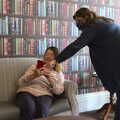 Sis shows a phone photo in the 'library', A Trip to Grandma J's, Spreyton, Devon - 2nd June 2021