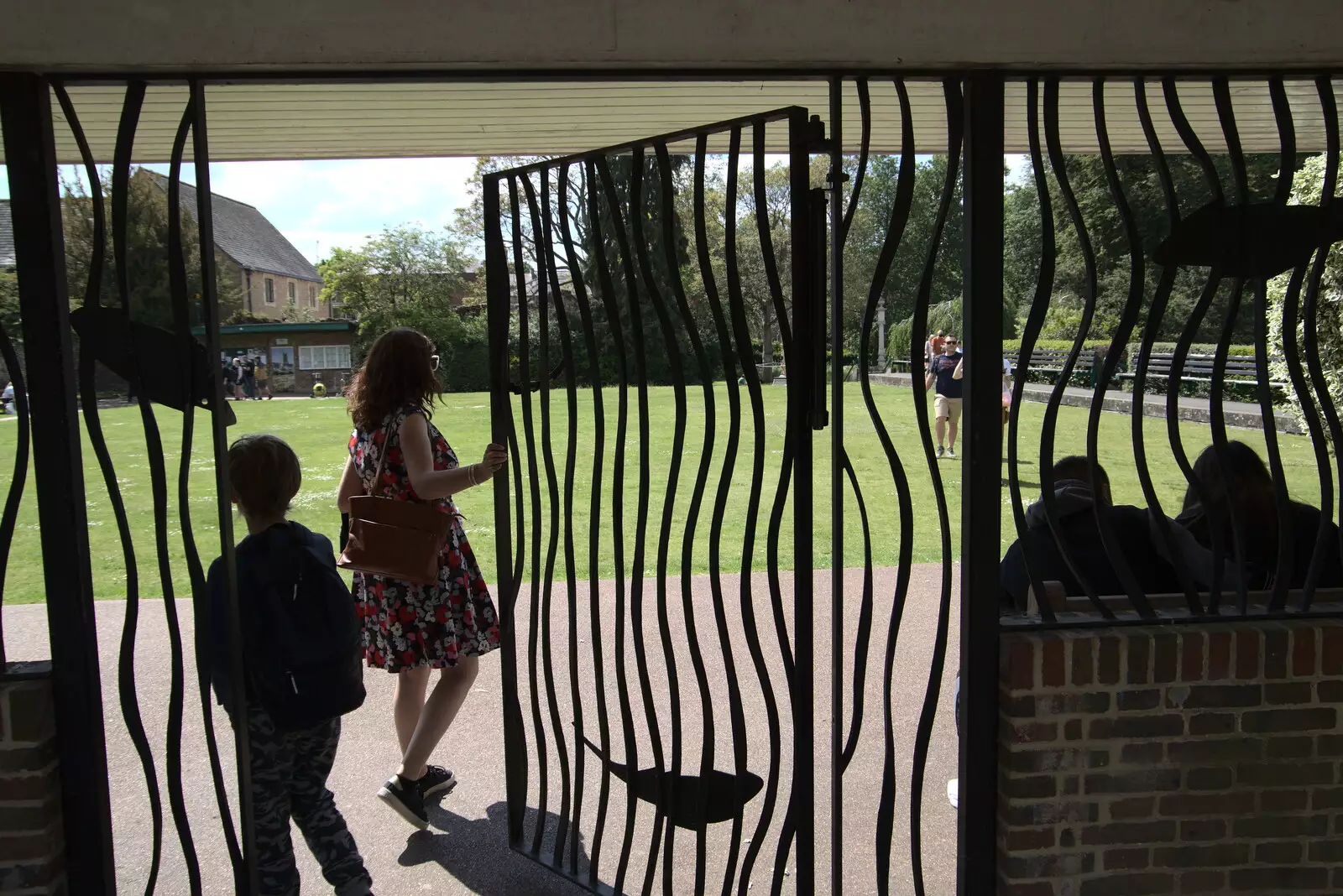 Isobel goes through a funky iron gate, from A Weekend at the Angel Hotel, Bury St. Edmunds, Suffolk - 5th June 2021