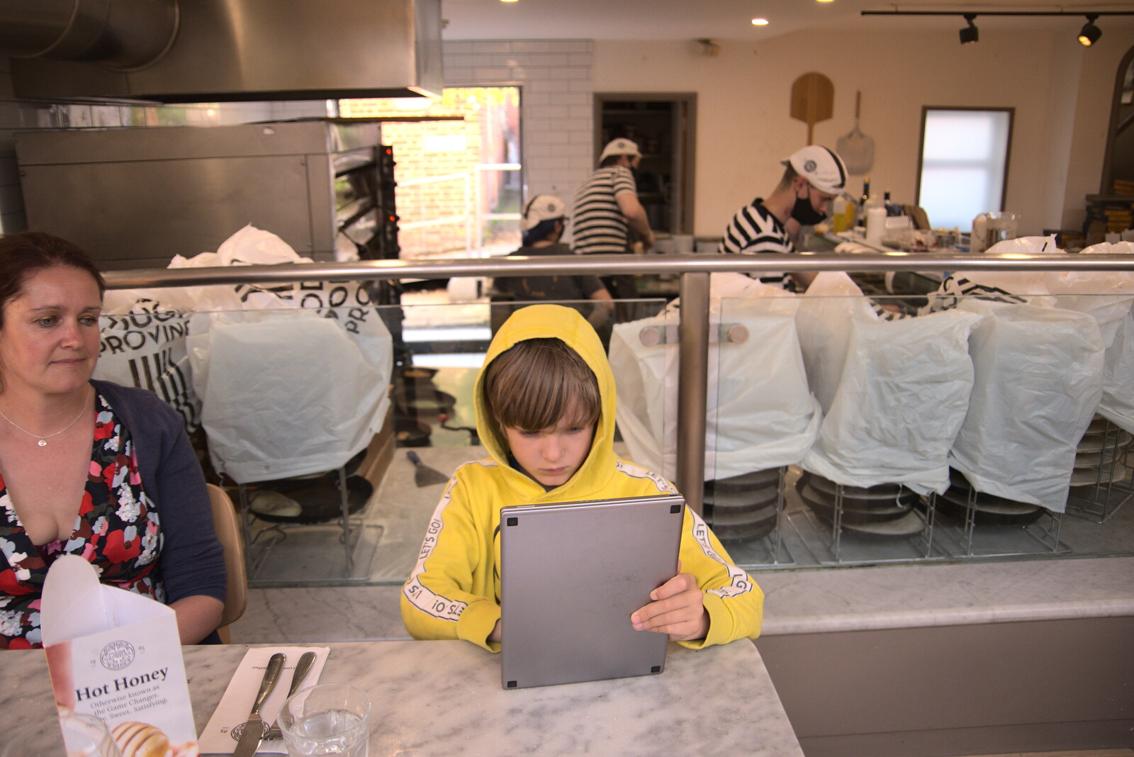 Harry checks his tablet in Pizza Express from A Weekend at the Angel Hotel, Bury St. Edmunds, Suffolk - 5th June 2021