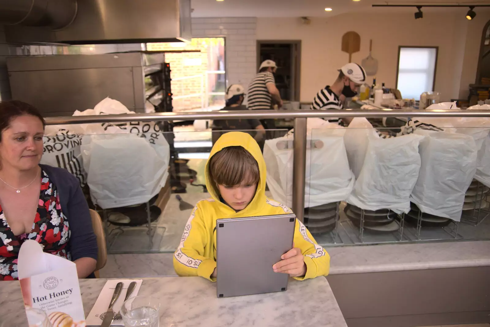 Harry checks his tablet in Pizza Express, from A Weekend at the Angel Hotel, Bury St. Edmunds, Suffolk - 5th June 2021