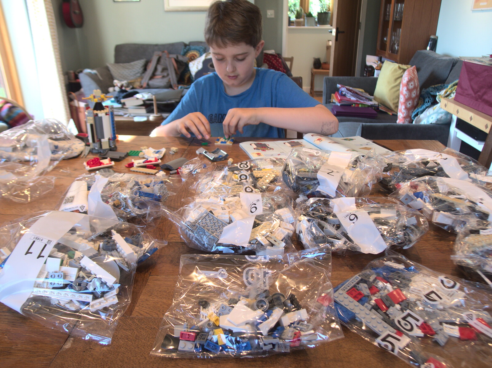 Fred starts on a massive Saturn V Lego project from A Visit to the Kittens, Scarning, Norfolk - 13th June 2021