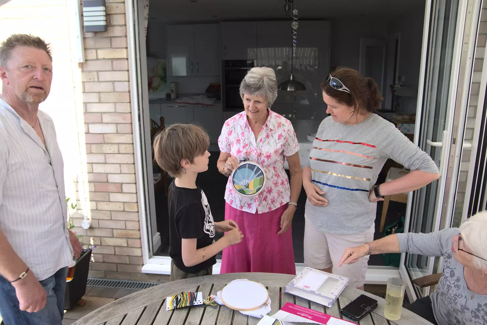 Jill shows Harry her cross-stitch project, from The BSCC at Earl Soham and at Colin and Jill's, Eye, Suffolk - 26th June 2021