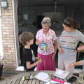 Jill shows Harry her cross-stitch project, The BSCC at Earl Soham and at Colin and Jill's, Eye, Suffolk - 26th June 2021