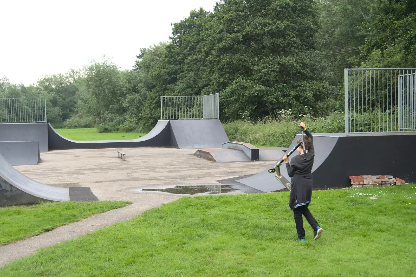 Fred hauls his scooter off to the ramps, from New Kittens, and The Skate Park, Town Moors, Eye, Suffolk - 3rd July 2021