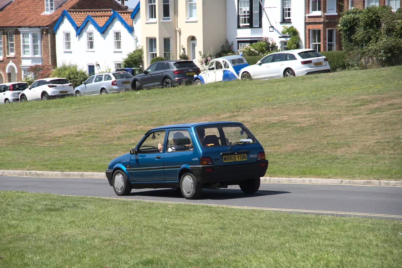 A rare mint-condition Austin Metro Rio trundles by, from A Day on the Beach, Southwold, Suffolk - 18th July 2021