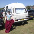 Fred shakes out a towel by the van, A Day on the Beach, Southwold, Suffolk - 18th July 2021