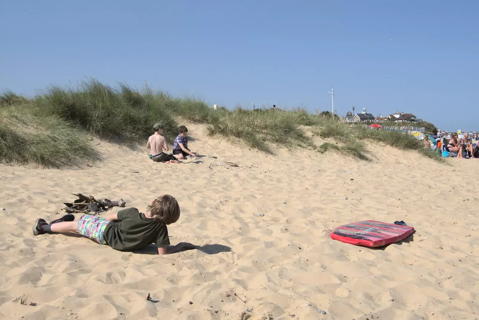 Harry pokes around in the sand, from A Day on the Beach, Southwold, Suffolk - 18th July 2021