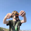 Harry shows off a Ninja Turtle he found in the sand, A Day on the Beach, Southwold, Suffolk - 18th July 2021