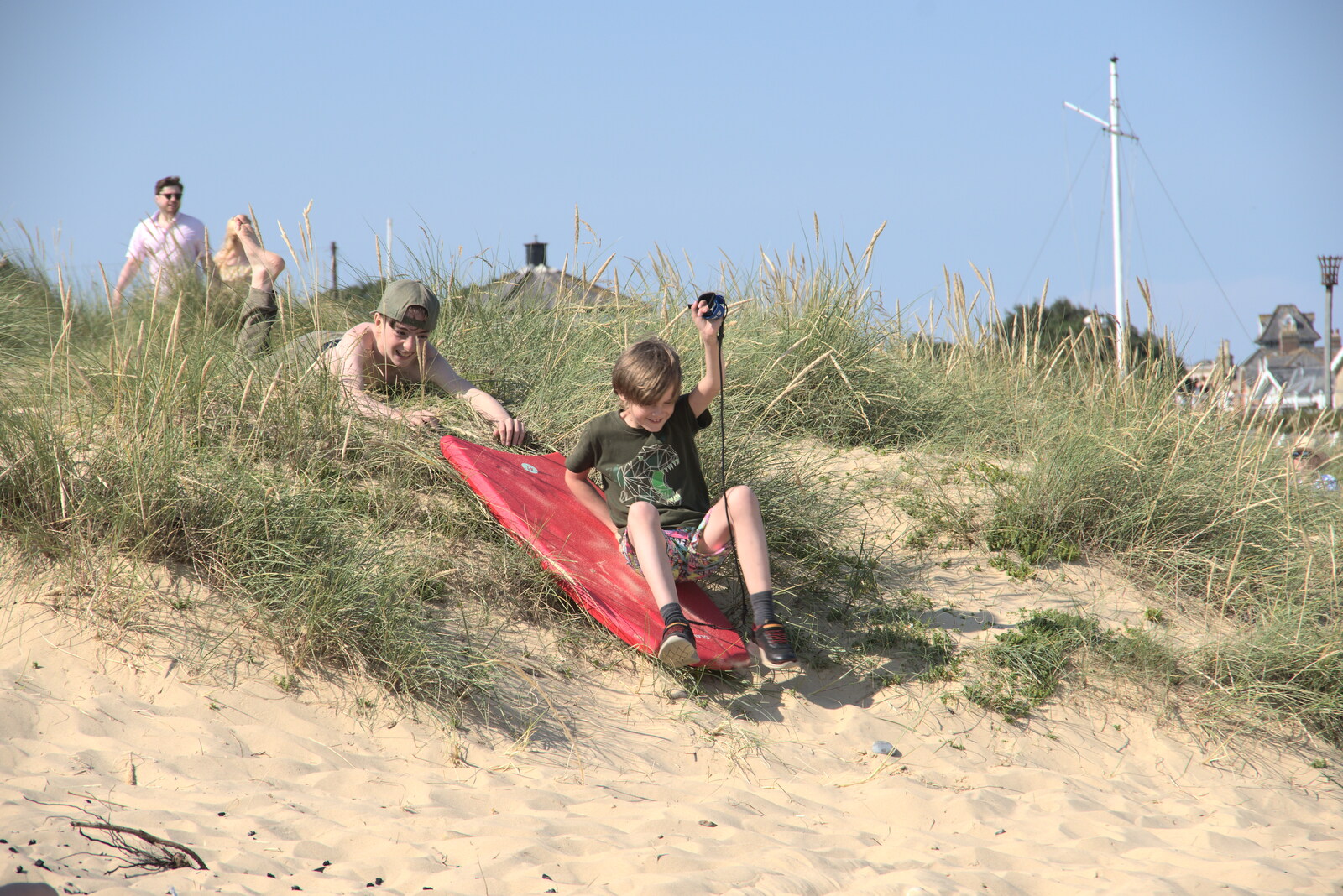 Harry gets a push down the dunes on a body board from A Day on the Beach, Southwold, Suffolk - 18th July 2021