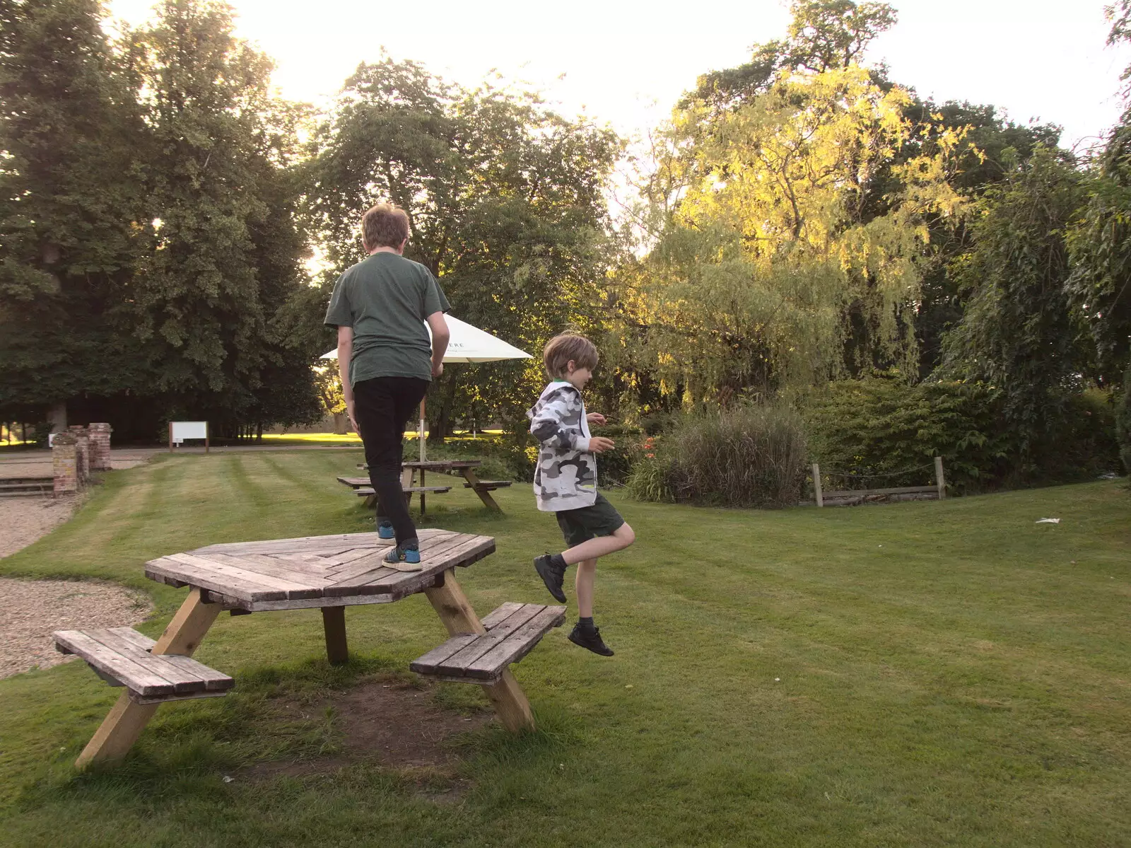 Harry jumps off a bench, from Hares, Tortoises and Station 119, Eye, Suffolk - 19th July 2021