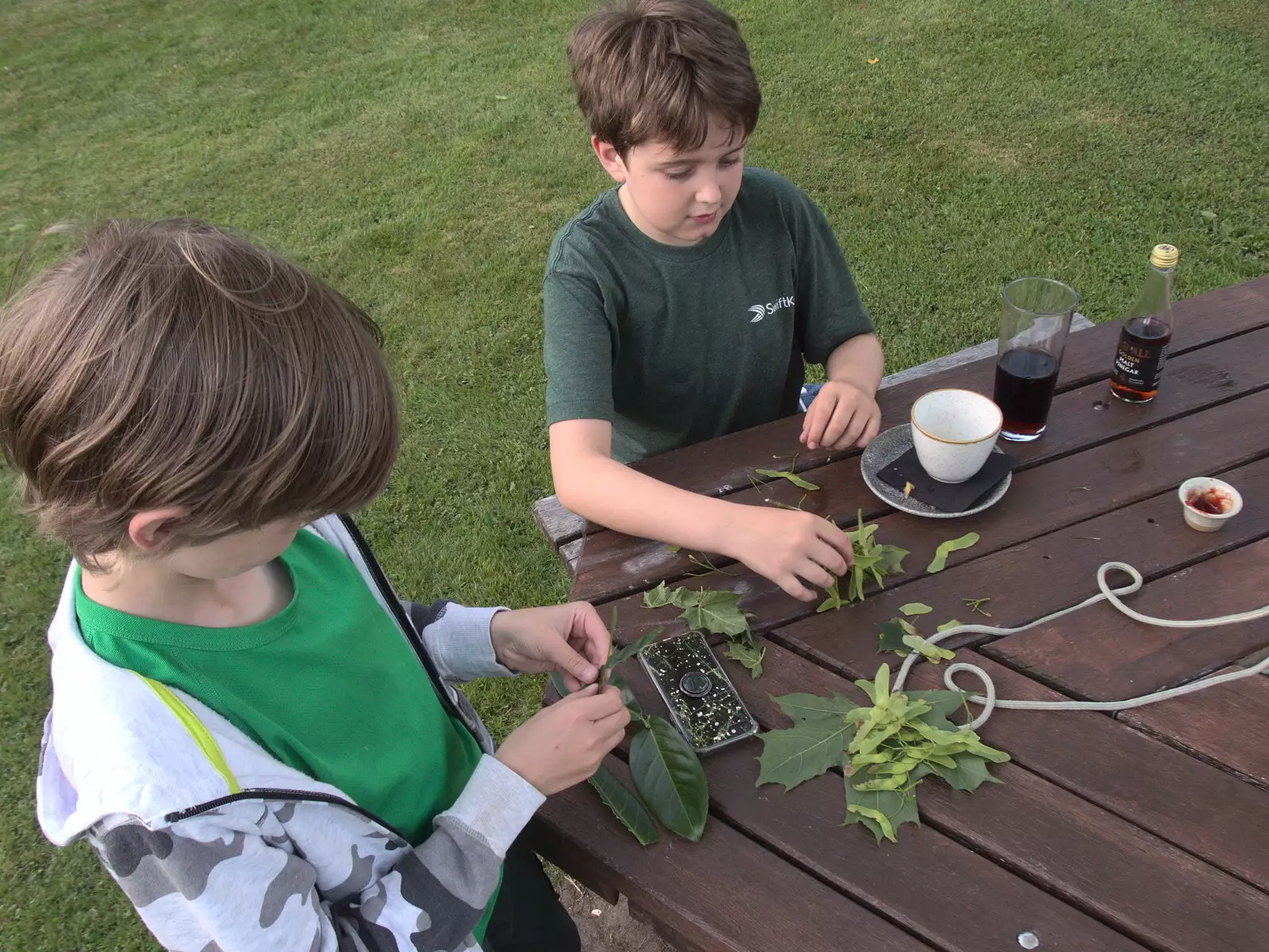 The boys mess around with helicopter seeds, from Hares, Tortoises and Station 119, Eye, Suffolk - 19th July 2021