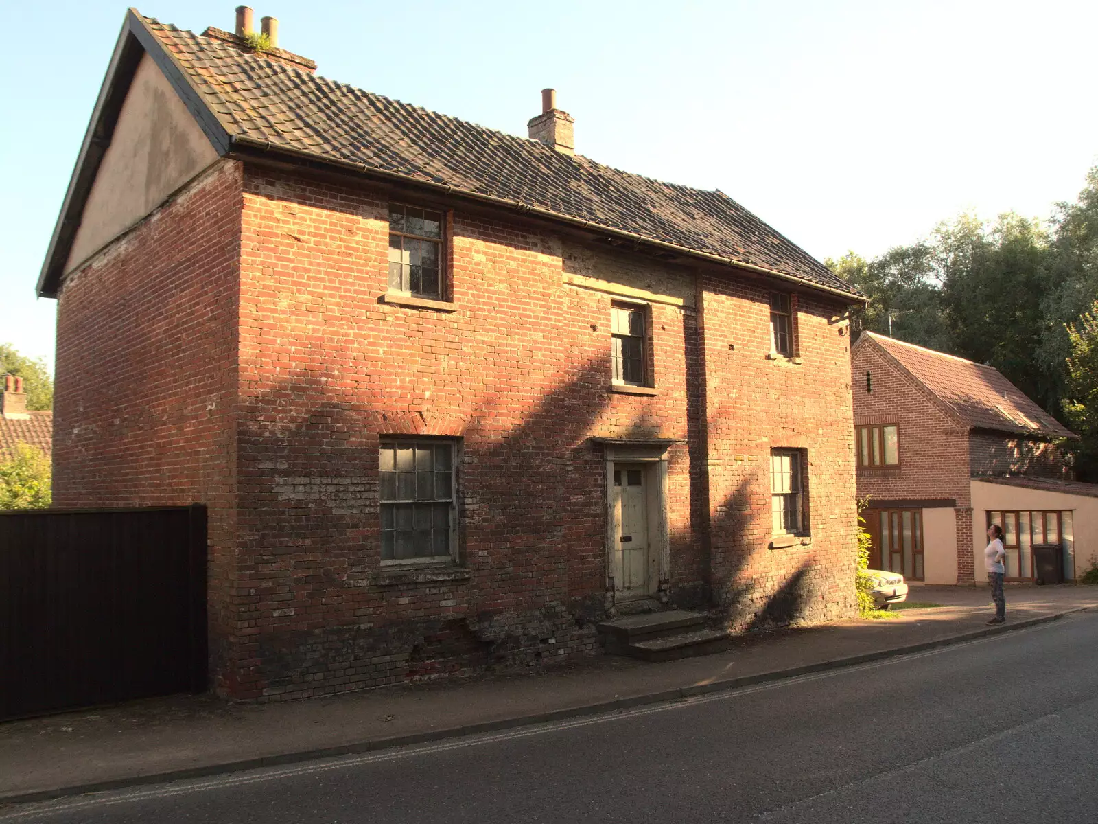 Isobel looks at the house on Magdalen Street, from Hares, Tortoises and Station 119, Eye, Suffolk - 19th July 2021